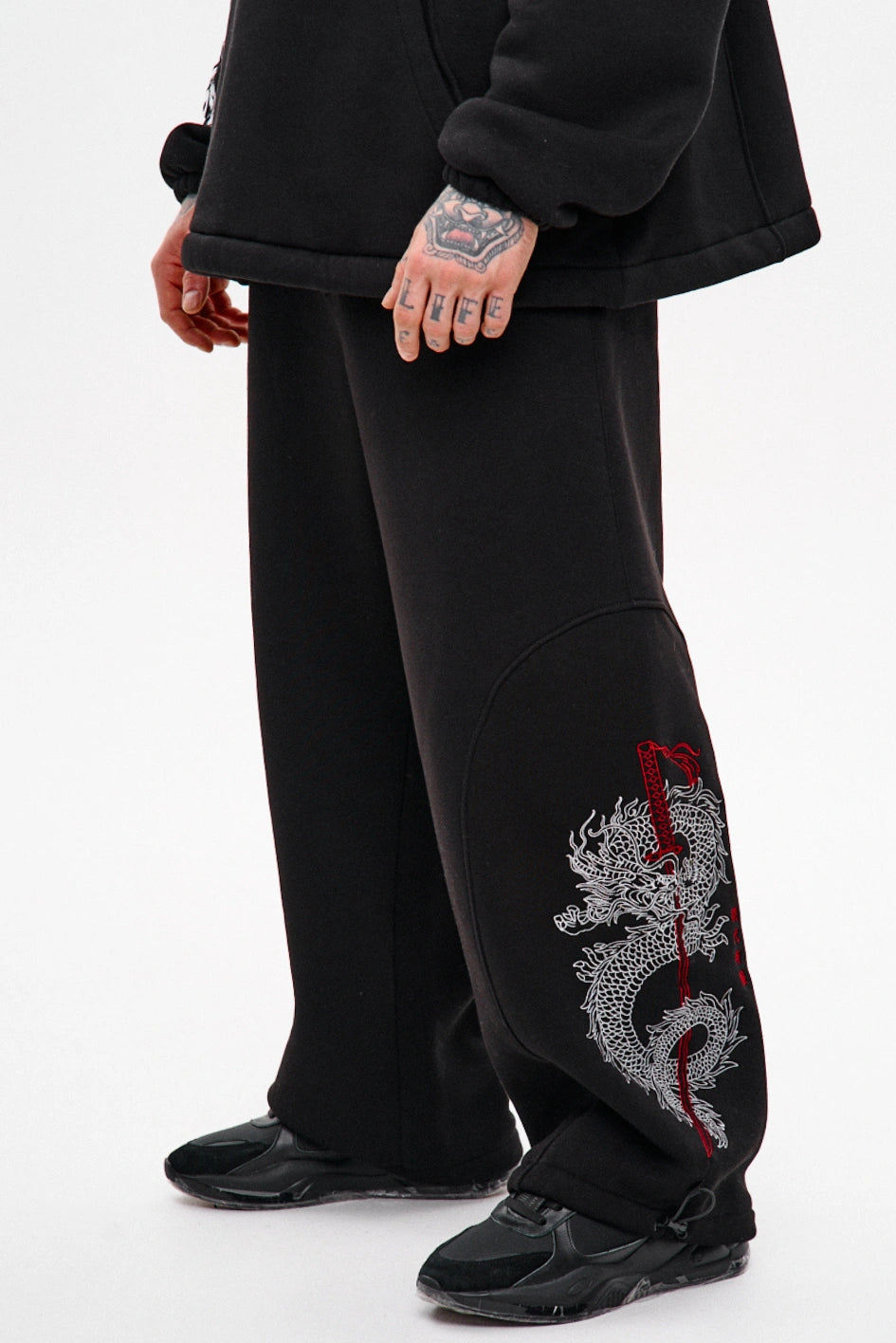 Wide sweatpants with embroidery “Ryuu”