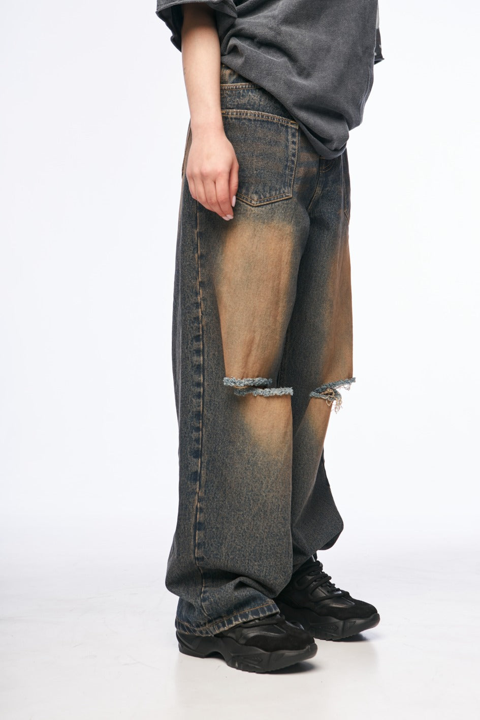 Baggy Jeans with Distressed Detailing